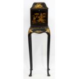 A LATE 19TH / EARLY 20TH CENTURY CHINOISERIE LACQUERED CABINET on stand, 109cm high