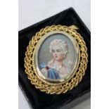 AN 18 CARAT YELLOW GOLD MOUNTED BROOCH OR PENDANT with miniature painted panel, 4cm across