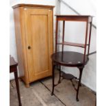 A EARLY 20TH CENTURY WALNUT BOOKCASE with fielded panel door, standing on bracket feet (one