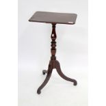 A 19TH CENTURY OCCASIONAL TABLE with a rectangular plumb mahogany top, turned stem and a triform