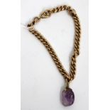 A VICTORIAN 9CT ROSE GOLD BRACELET with an amethyst pendant (20 grams approximately)
