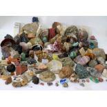 A SELECTION OF FOSSILS, ROCKS AND SPECIMENS to include ammonite, pyrite and other rock formed