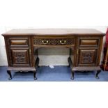 A LATE VICTORIAN MAHOGANY SIDE BOARD with blind fret carved decoration, 197cm wide