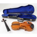 AN OLD VIOLIN with two part back, 33cm long together with a violin bow and a fitted case