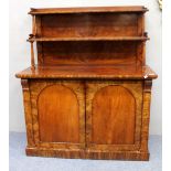 AN EARLY VICTORIAN FLAME MAHOGANY CHIFFONIER the raised back with two shelves and turned supports