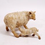 SUSIE MARSH a ceramic sculpture of a sheep, 45cm in length and a lamb, 29cm in length, both signed