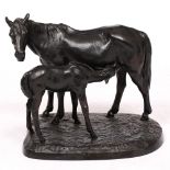 A MID 20TH CENTURY RUSSIAN SCHOOL CAST IRON SCULPTURE of a mare and foal, indistinctly signed to the