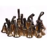 A WILLIAM IV BRONZE GRADUATED SET OF SIXTEEN HAND BELLS the largest indistinctly engraved