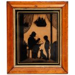AN ANTIQUE SILHOUETTE PICTURE 'Nelson's First Lesson', set within a maplewood frame 36.5cm high x