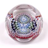 A WHITEFRIARS GLASS PAPERWEIGHT with Millefiori bands of canes and signed and dated 1973, 7cm wide x