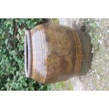 A LARGE CHINESE OVOID HONEY GLAZED PLANTER decorated with a dragon approximately 64cm diameter x
