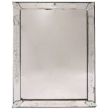 A VENETIAN RECTANGULAR FRAMED WALL MIRROR with engraved mirrored slips to the border and with leaf