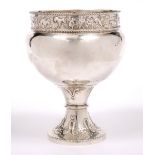 AN ARTS AND CRAFTS SILVER LARGE FOOTED CUP with bands of chased and engraved decoration and on a