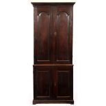 A LARGE MID 18TH CENTURY OAK ESTATE CABINET with fielded panelled doors, carrying handles to the