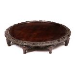 A 19TH CENTURY SCOTTISH MAHOGANY 'LAZY SUSAN' the dish top with rose and thistle carved border,