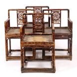 A MATCHED SET OF FOUR REGENCY 'BRIGHTON PAVILLION' STYLE LACQUERED BAMBOO ARMCHAIRS with decorated