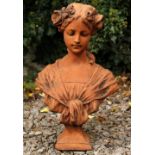 A CAST BUST OF A GIRL WITH FLOWERS IN HER HAIR 29cm x 51cm