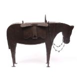 AN OLD PAINTED TIN MODEL OF A HORSE with hinged saddle, 47cm long x 38cm high