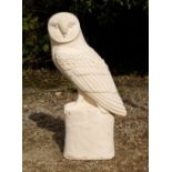 A CAST STONE FIGURE OF A BARN OWL 78cm high