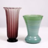 AN EARLY 20TH CENTURY GERMAN AMETHYST COLOURED GLASS VASE of ribbed flaring cylindrical form, the