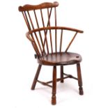 A LATE 18TH CENTURY THAMES VALLEY WINDSOR ARMCHAIR with H shaped stretcher, on turned tapering legs,