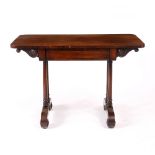 A WILLIAM IV ROSEWOOD LIBRARY TABLE with scroll decoration to either end, central frieze drawer,