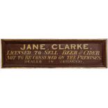 A 19TH CENTURY PAINTED GROCER'S LICENSEE SIGN with moulded frame 'Jane, Clarke., licensed to see