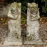 A PAIR OF CARVED ORIENTAL FIGURES OF MYTHICAL CREATURES each 60cm high