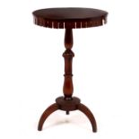 A REGENCY PLUM PUDDING MAHOGANY CIRCULAR OCCASIONAL TABLE with pierced frieze, carved and turned