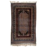 A BALOUCH PRAYER RUG with a blue ground and a banded border, 83cm x 140cm together with a Chinese