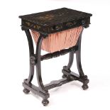 A VICTORIAN JENNENS & BETTRIDGE PAPIER-MACHE BLACK LACQUERED WORKTABLE with chinoiserie gilt and