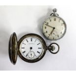 A WALTHAM FULL HUNTER POCKET WATCH with a silver plated case and enamelled dial with Arabic numerals