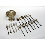 A MAPPIN & WEBB SILVER TAZZA on spreading circular base and a selection of silver teaspoons, dessert