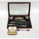 A SILVER MOUNTED MANICURE OR GROOMING SET a silver commemorative spoon and a set of boxed 9ct gold