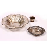 A PIERCED SILVER BREAD BASKET 26cm diameter together with a pierced silver bonbon dish and a small