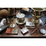 A SELECTION OF SILVER PLATED ITEMS to include a goblet, a champagne bucket, table cigarette box, two