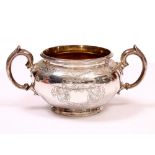 A SCOTTISH SILVER SUGAR BASIN with two looping handles, makers mark of Crighton, 13.5cm diameter and