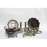 A PAIR OF SILVER PLATED SAUCE BOATS together with a set of three silver plated chamber candlesticks,