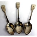 THREE VICTORIAN SILVER TABLE SPOONS with engraved bird crests, hallmarked for London with various