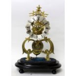 A VICTORIAN SKELETON CLOCK with silvered dial, the clock 28.5cm high and mounted on an ebonised base