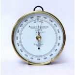 AN ANEROID BAROMETER 'Mark 2' by Short & Mason, with ring suspension 13.5cm diameter