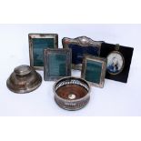 THREE SILVER PICTURE FRAMES a white metal picture frame, a silver inkwell and a silver plated wine