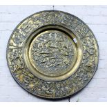 AN INDIAN CIRCULAR BRASS TRAY with hunting scenes 77cm diameter