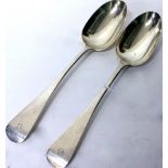 A PAIR OF EARLY VICTORIAN SILVER RAT TAIL SERVING SPOONS each with marks for London 1840, 22cm in
