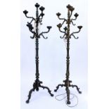 A PAIR OF GILT METAL SEVEN BRANCH STANDARD LAMPS each 185cm in height