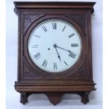 A SETH THOMAS OAK CASED WALL CLOCK reputedly from New York railway station 48cm wide x 58cm high