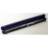 A LATE 19TH CENTURY AMERICAN 'FAIRCHILD 5' DIP PEN with engraved yellow metal nib and grip with a