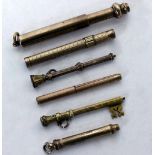 A SELECTION OF GOLD AND UNMARKED YELLOW METAL PROPELLING PENS pencils and toothpicks to include