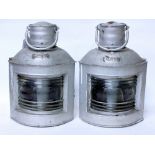 A PAIR OF 20TH CENTURY GALVANIZED PORT AND STARBOARD SHIPS LAMPS with carrying handles, 39cm high (