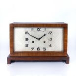 Art Deco Mantle clock in squared wooden case 22cm high, 31cm wide.